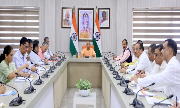 Honorable Chief Minister Yogi Adityanath holding a review meeting on pothole removal and road repair works at his official residence on Tuesday